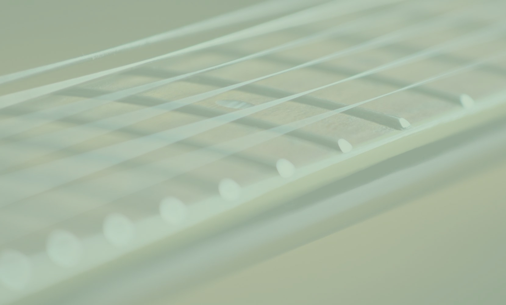 a greenish fretboard